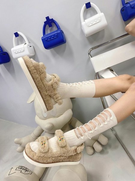 Chanel Sheep curl sandals