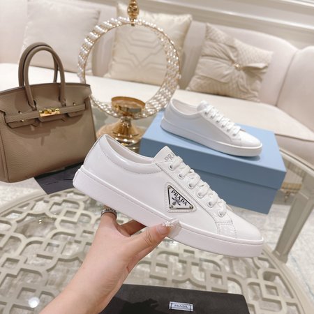 Prada Metal Logo Lace-Up Sneakers Round Toe