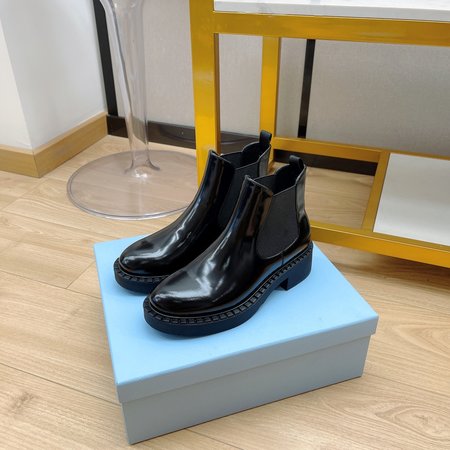 Prada Elastic band Chelsea booties in shiny leather