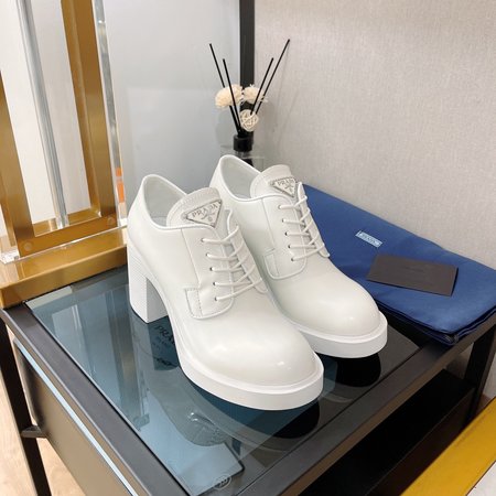 Prada Lace up high heel boots